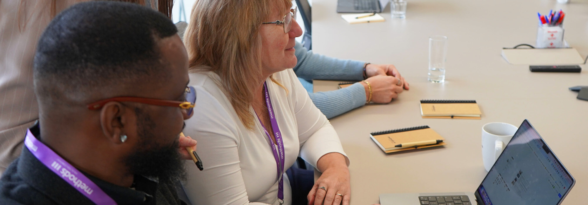 Decorative photographs of Methods employees in our London office